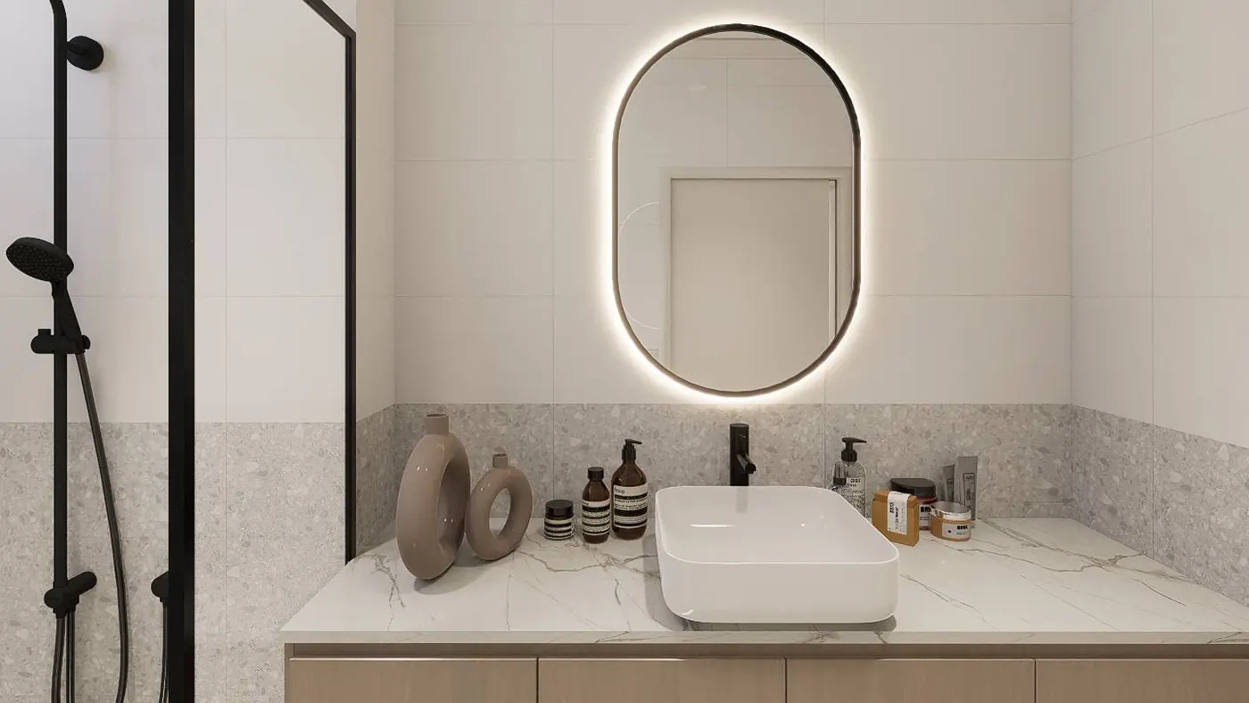 Ensuite vanity with a stone benchtop, vessel basin, backlit oval mirror and terrazzo wall tiling.